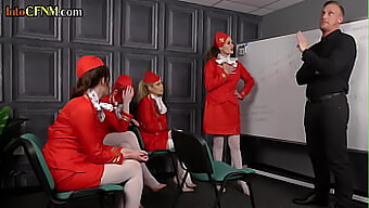 A Group Of Dominating Stewardesses In Uniform Engage In Fellatio With A Man